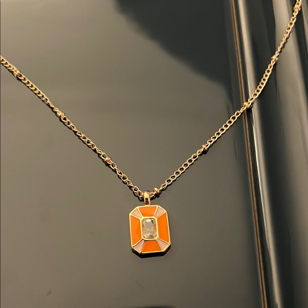 Elegant Gold Necklace with Orange Pendant‎
